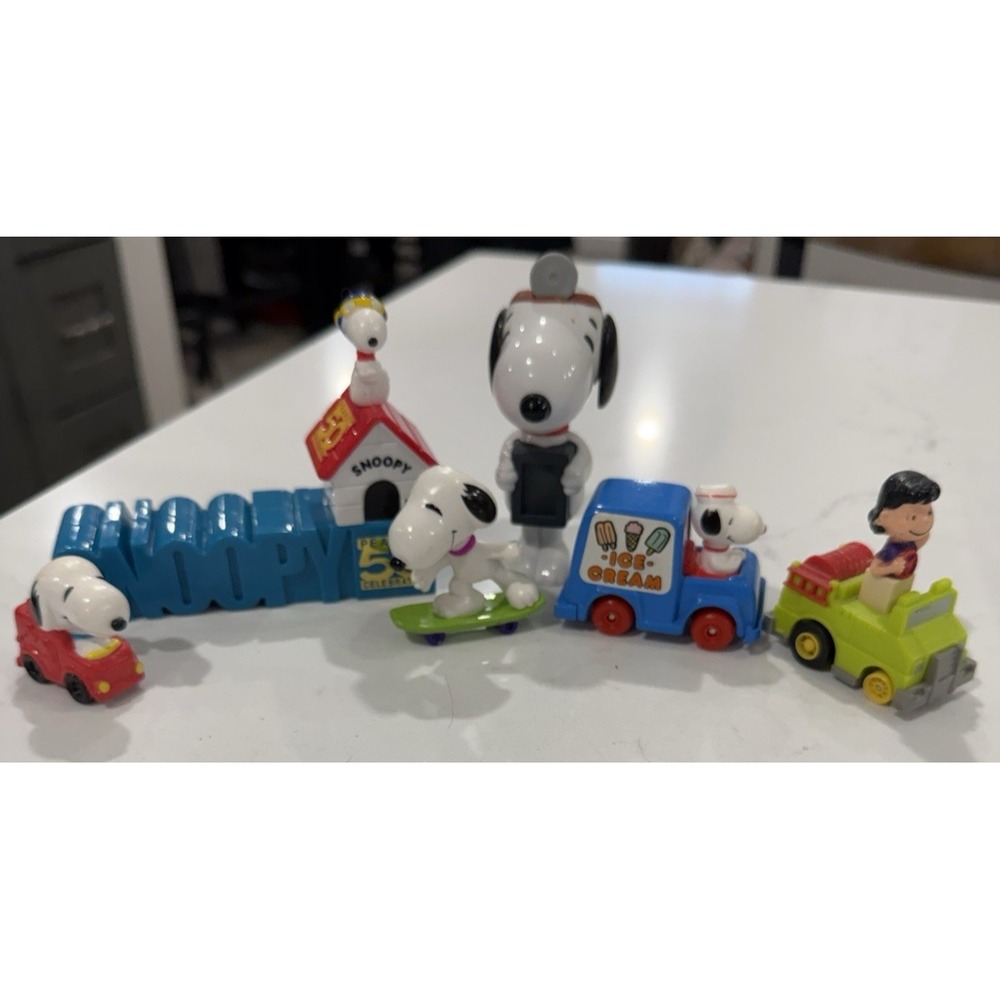Peanuts SNOOPY Lot of 7 -50th Anniversary Figurine & base metal/plastic car misc